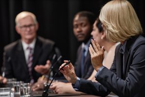 female-politician-asking-speaker-question-during-p-2025-03-08-16-11-02-utc-min