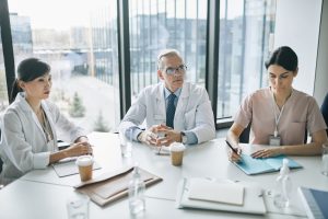 Group of Medics in Conference Room