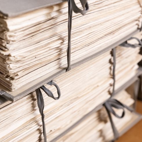 Stacks of old working Paper documents. Vintage Stacked files. Full frame