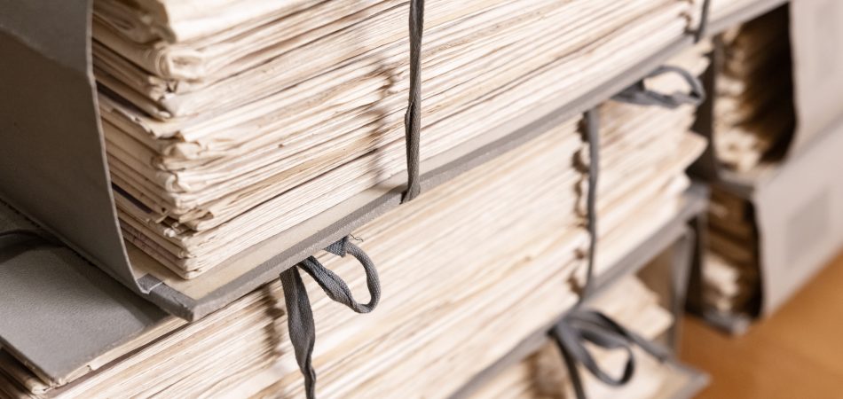 Stacks of old working Paper documents. Vintage Stacked files. Full frame
