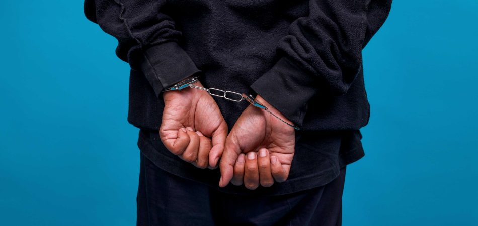 hands in handcuff after arrest