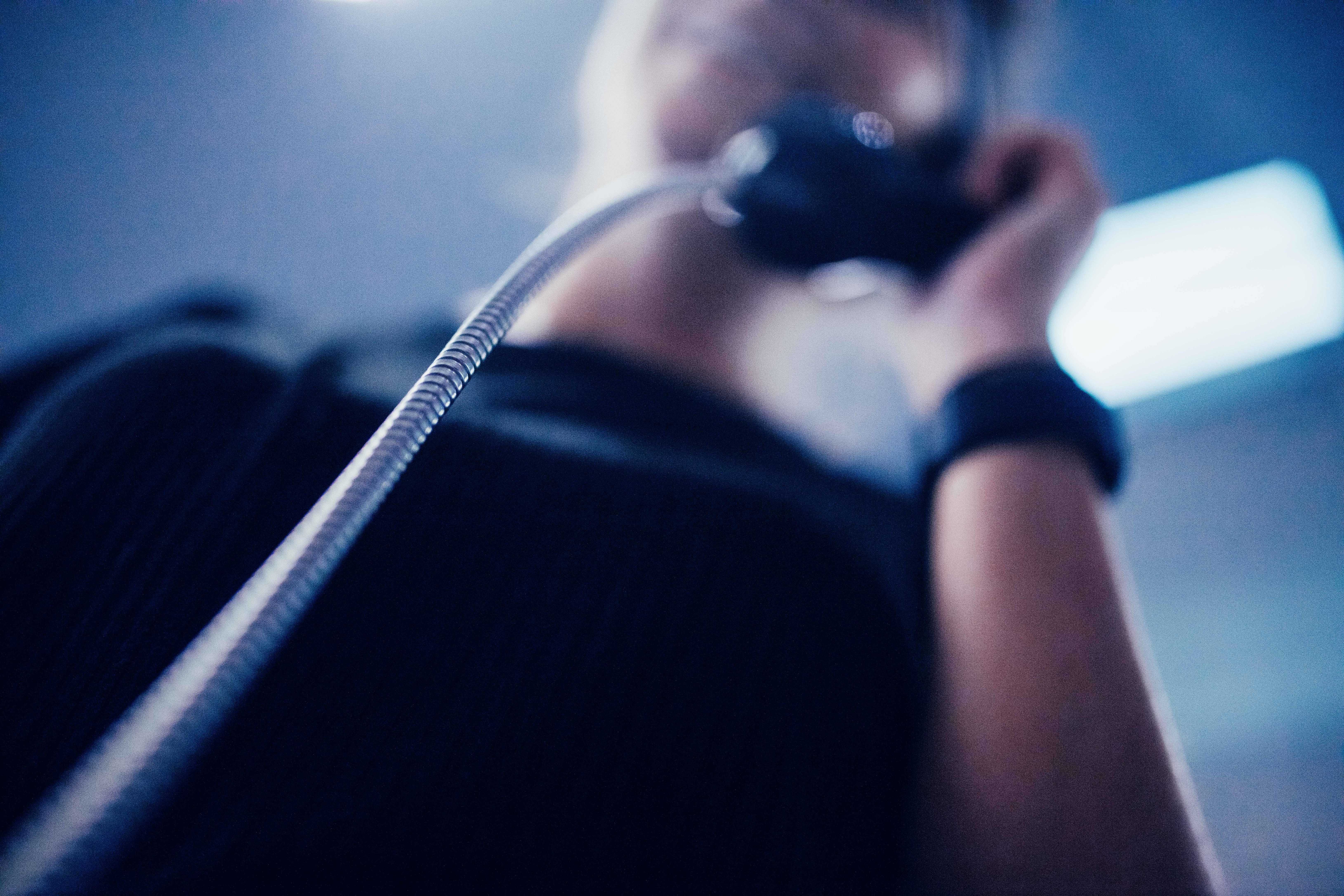 man using a wired telephone