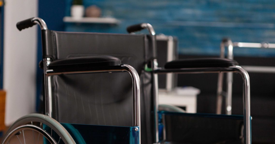 Louisiana personal injury damages shown with empty wheelchair in a room