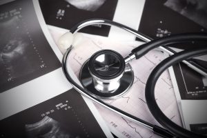 Medical Test - Stethoscope, ultrasound shot and cardiogram