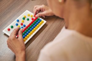 woman taking a neurolopsychological testing